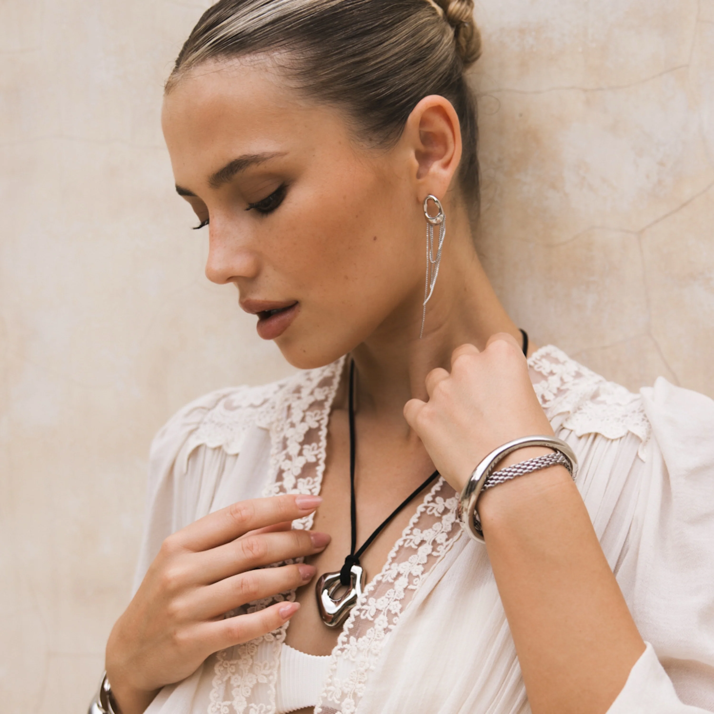 The Silhouette Draped Chain Earrings - Image 9